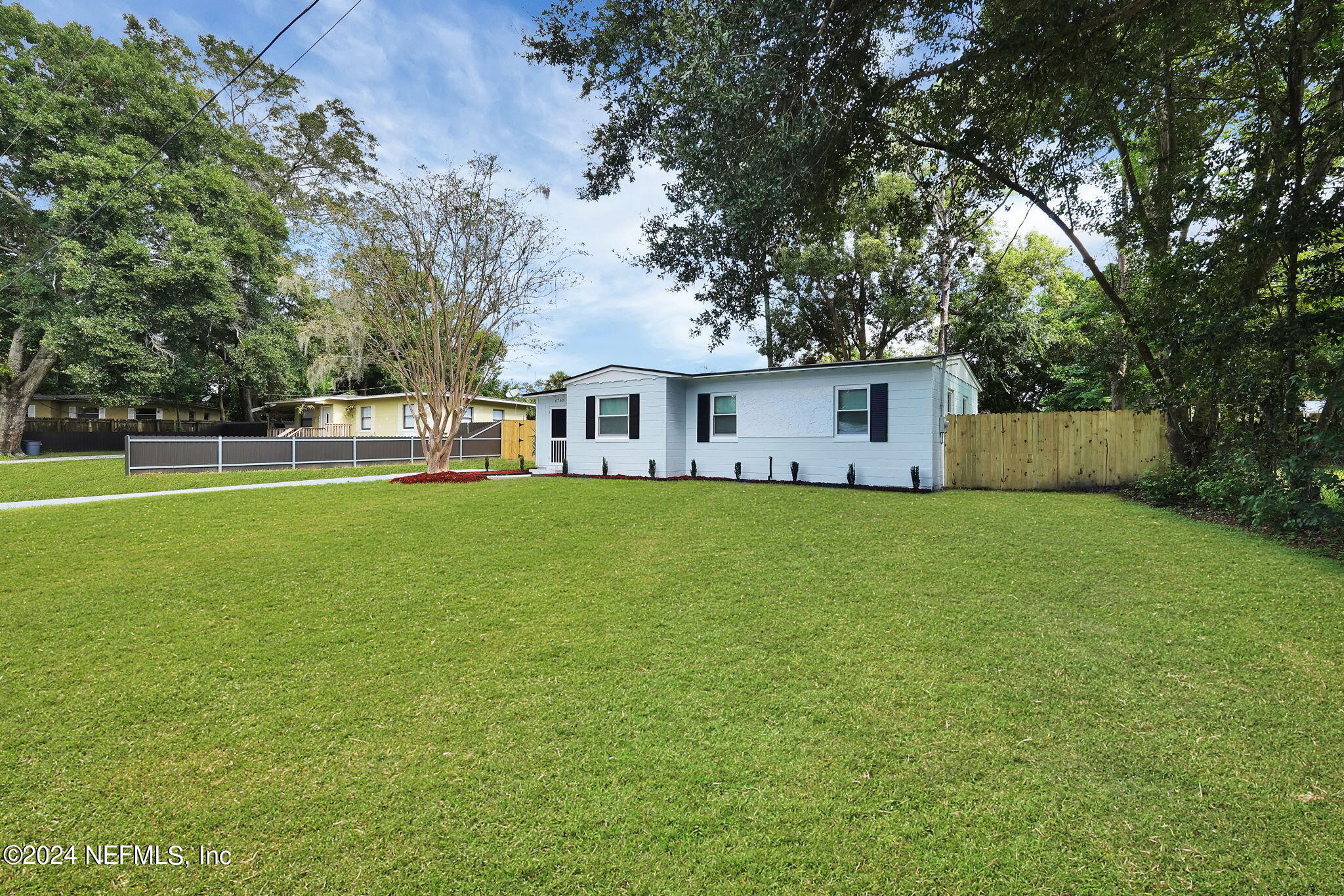 6763 Ector Road Jacksonville, FL 32211 - Photo 3 of 28 a view of house that has a big yard