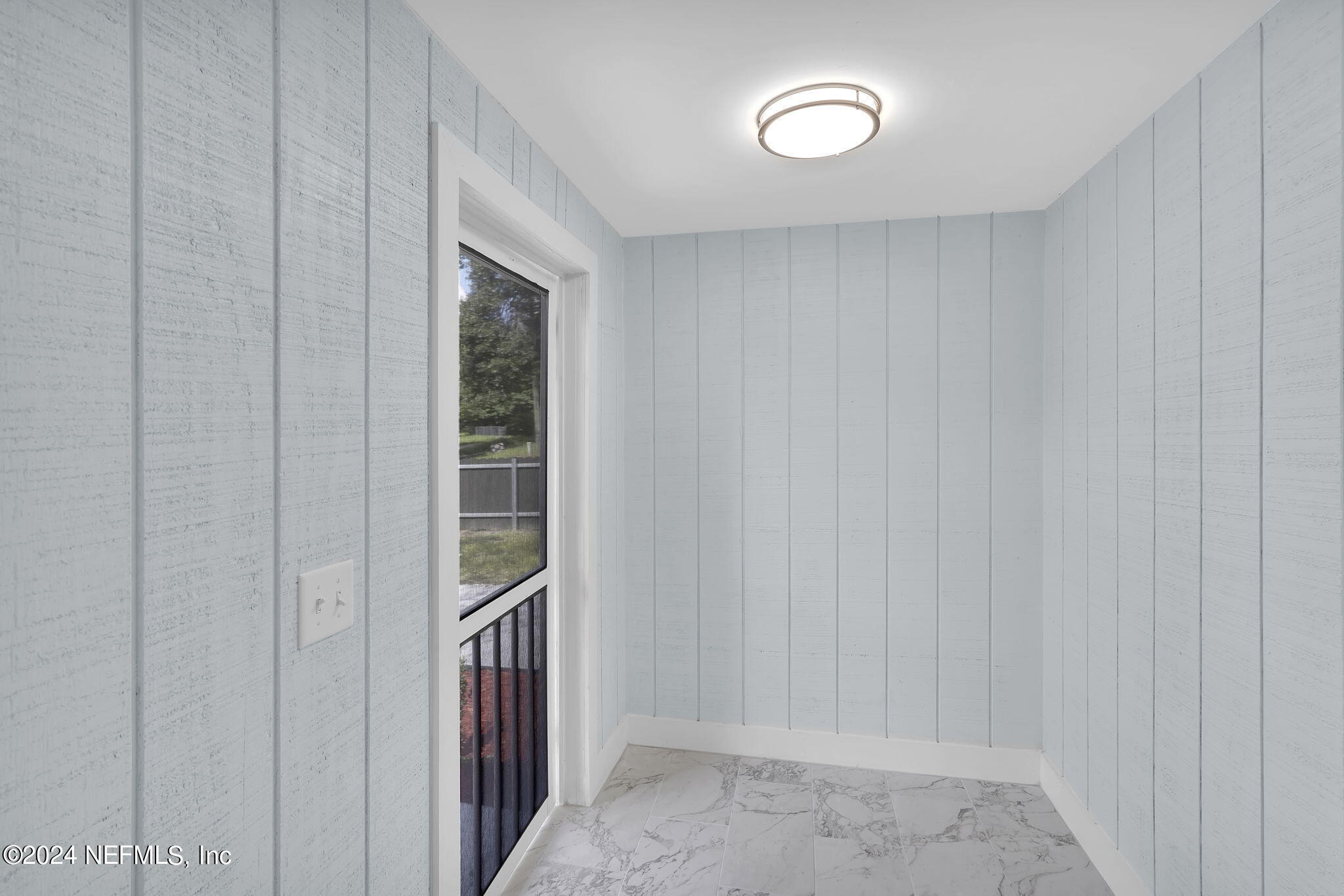 6763 Ector Road Jacksonville, FL 32211 - Photo 6 of 28 a view of a hallway to rooms