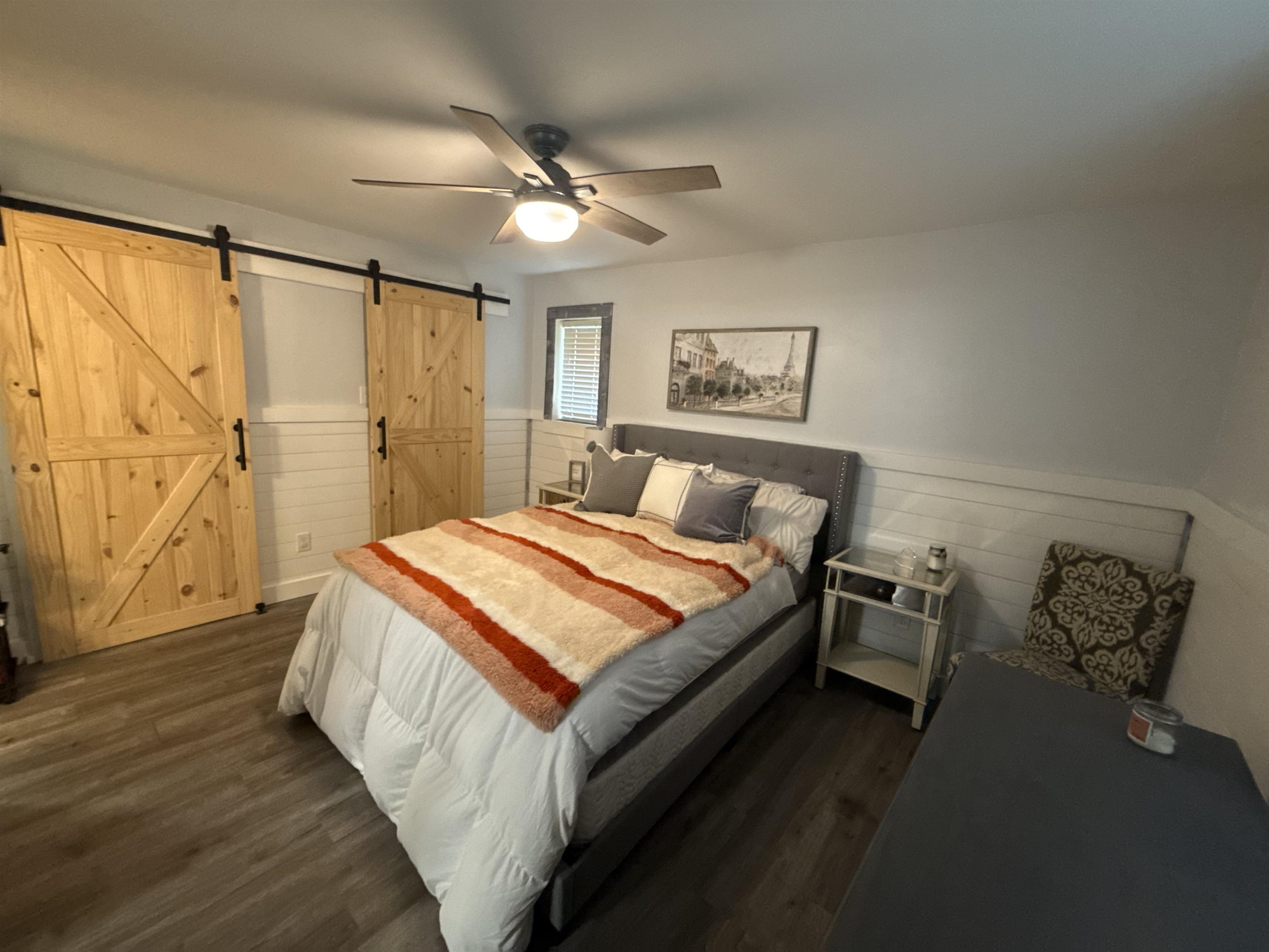 1814 Birch Post Cove, Unit 1 Germantown, TN 38138 - Photo 6 of 15 a bedroom with a bed and wooden floor