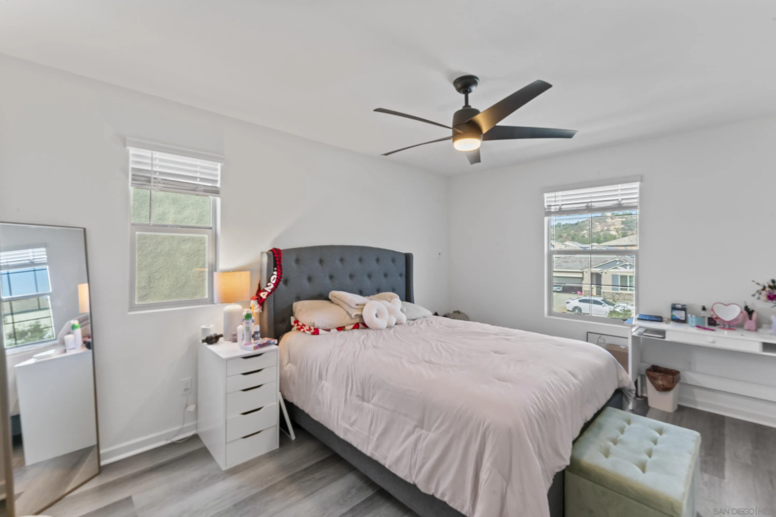 28032 Moosa Creek Way Valley Center Valley Center, CA 92082 - Photo 13 of 21 a bedroom with a bed and a window
