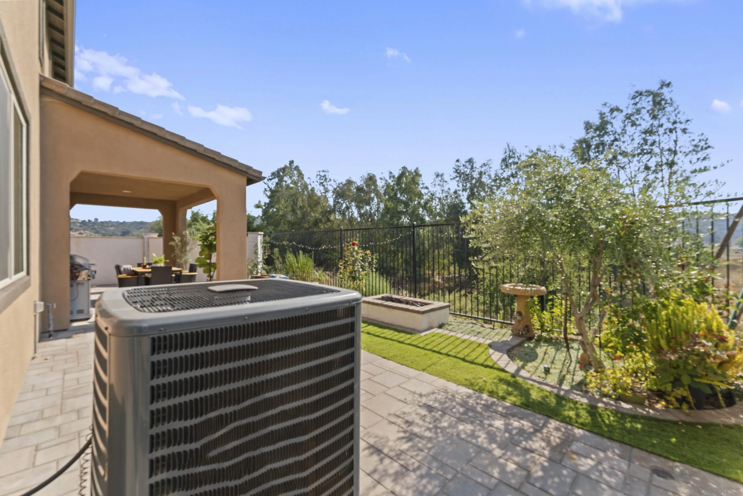 28032 Moosa Creek Way Valley Center Valley Center, CA 92082 - Photo 17 of 21 a view of a balcony with two chairs and a table