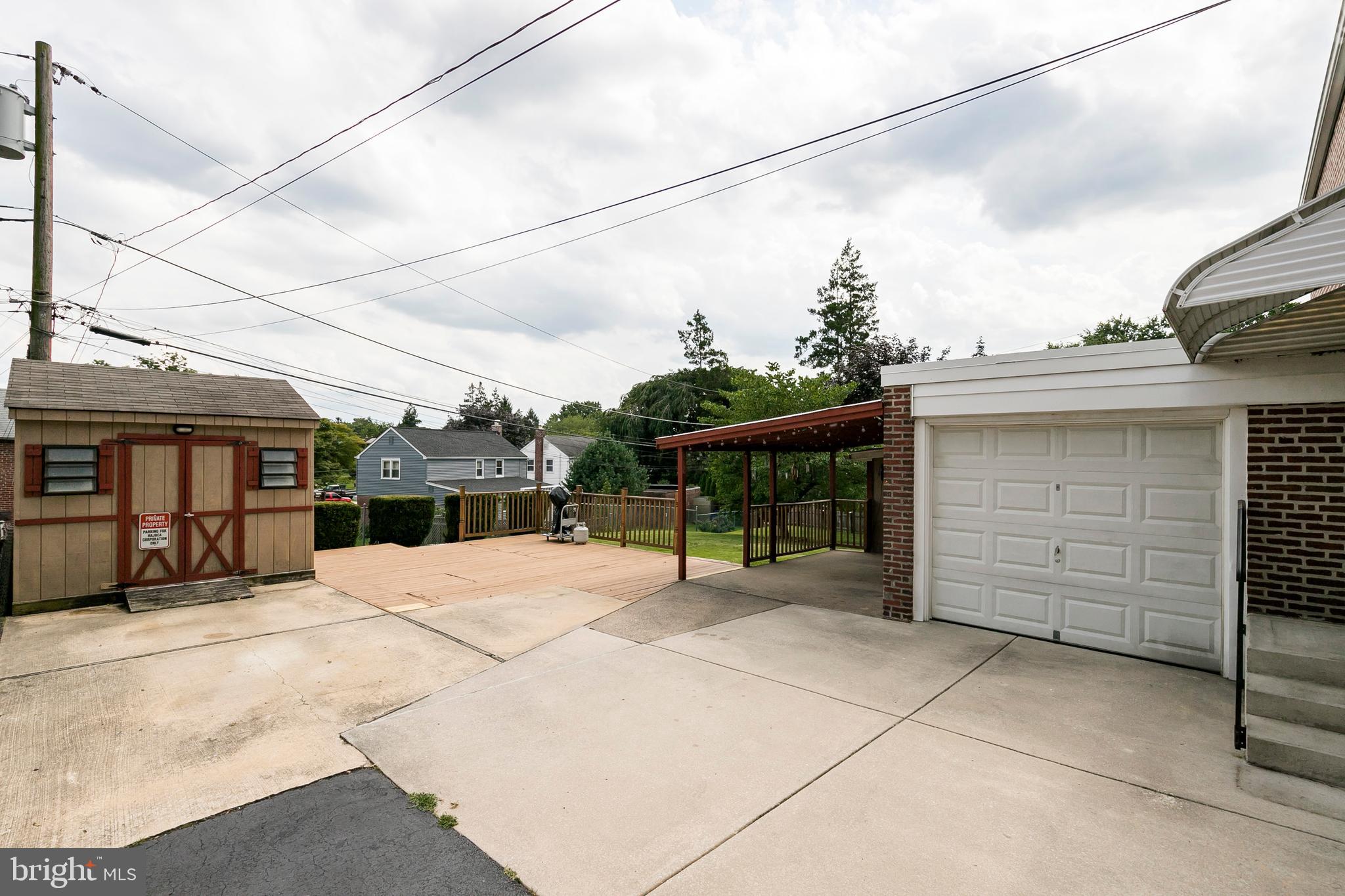 403 Avondale Road Havertown, PA 19083 - Photo 6 of 34 Attached Garage, large driveway, covered patio