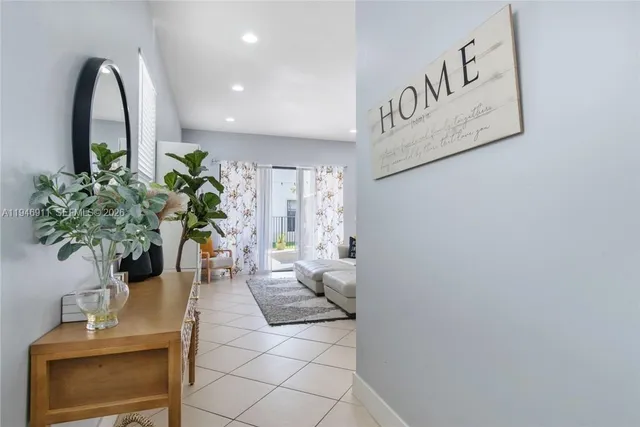 a view of entryway with livingroom