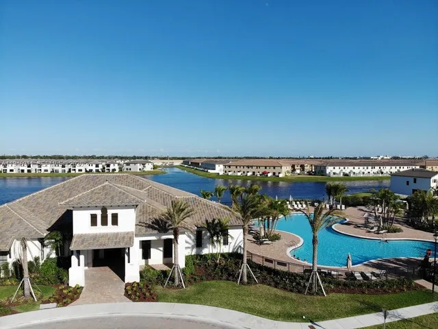 a front view of a building with garden
