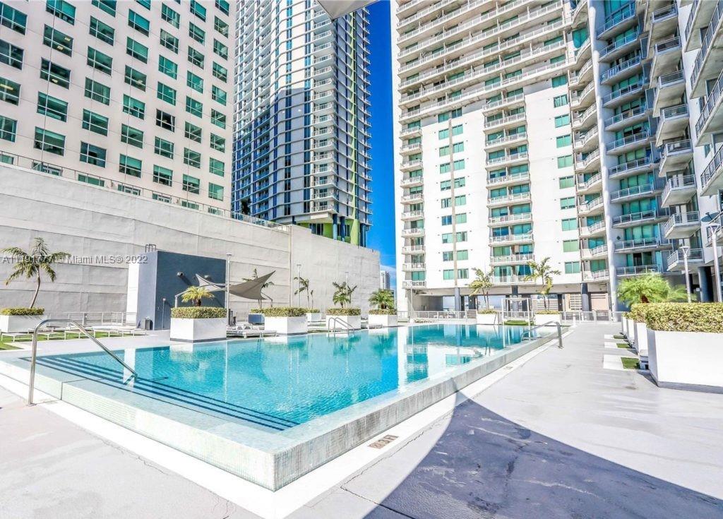 690 Southwest 1st Court, Unit 2926 Miami, FL 33130 - Photo 5 of 26 a view of swimming pool with outdoor seating