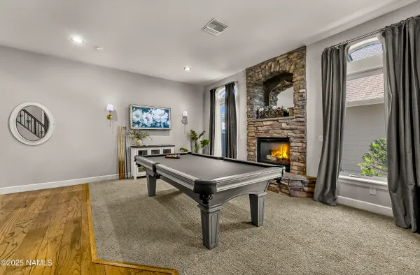 a room with furniture and a fireplace