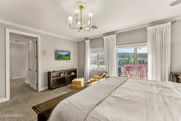 a bathroom with a granite countertop sink a large mirror and shower
