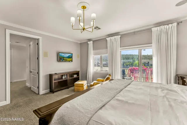 a bathroom with a granite countertop sink a large mirror and shower