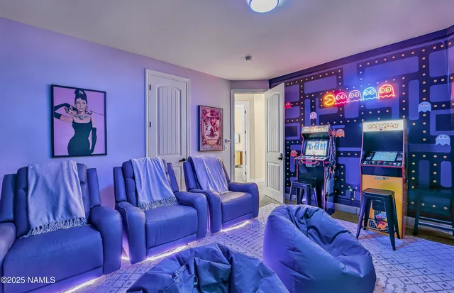 a bedroom with a bed dresser and window