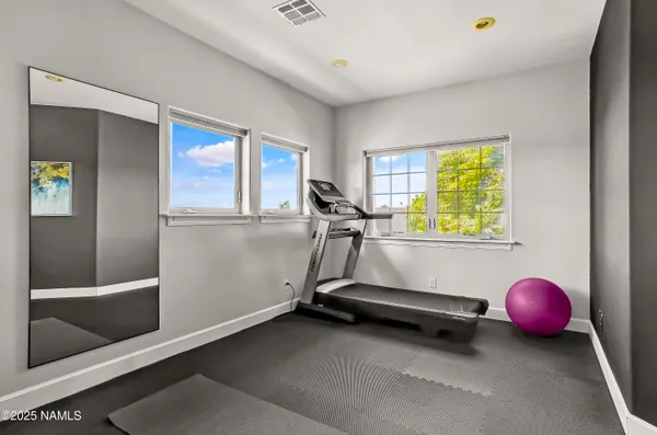 a view of a garden with a bench