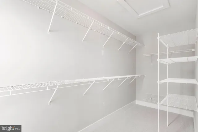 a view of a room with racks on the wall