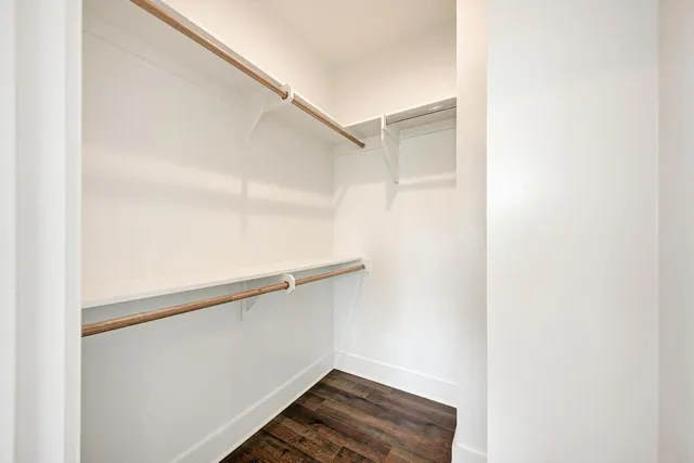 a bathroom with a granite countertop sink a mirror and a