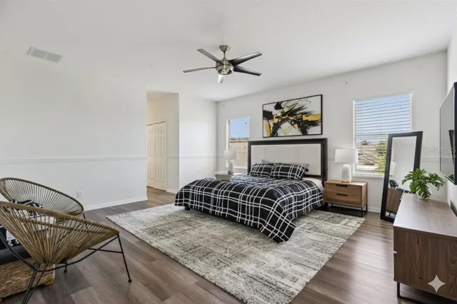 a bedroom with a bed and furniture