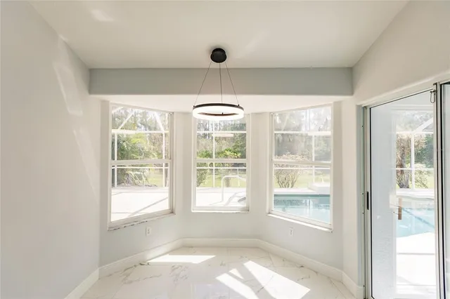 a view of an empty room and window