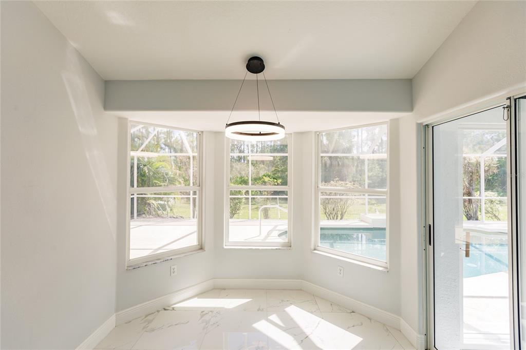 1304 Islamorada Boulevard Punta Gorda, FL 33955 - Photo 13 of 45 a view of an empty room with a window