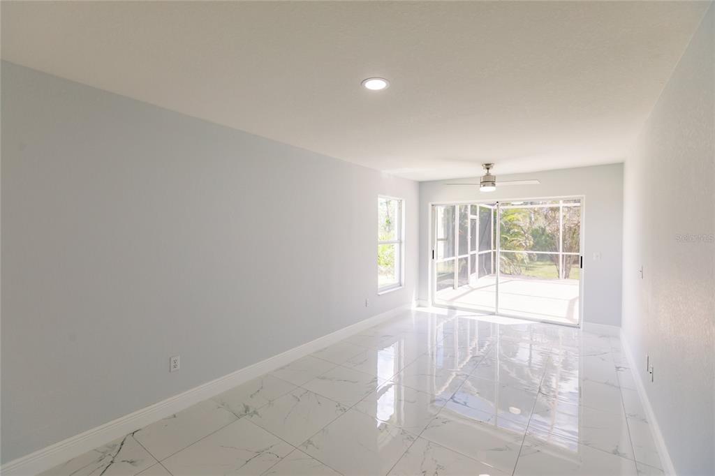 1304 Islamorada Boulevard Punta Gorda, FL 33955 - Photo 21 of 45 a view of an empty room with a window