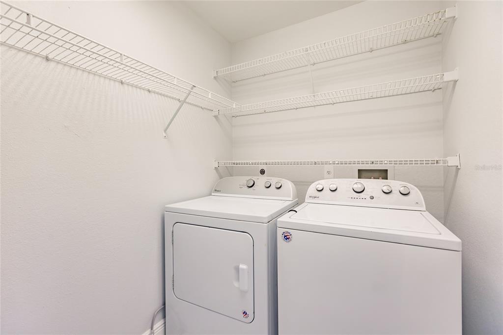1304 Islamorada Boulevard Punta Gorda, FL 33955 - Photo 26 of 45 a utility room with dryer and washer