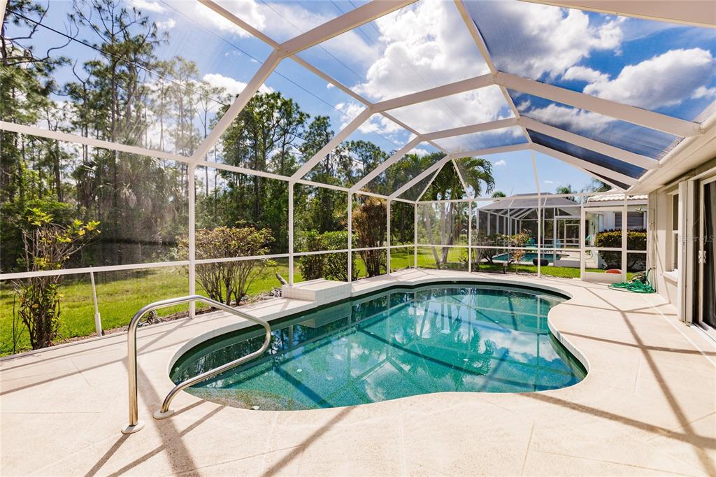 1304 Islamorada Boulevard Punta Gorda, FL 33955 - Photo 31 of 45 a view of a swimming pool with a patio