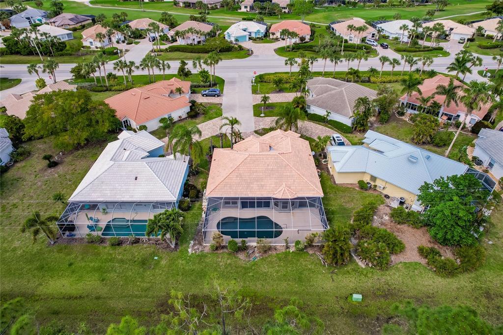 1304 Islamorada Boulevard Punta Gorda, FL 33955 - Photo 41 of 45 an aerial view of multiple houses with yard