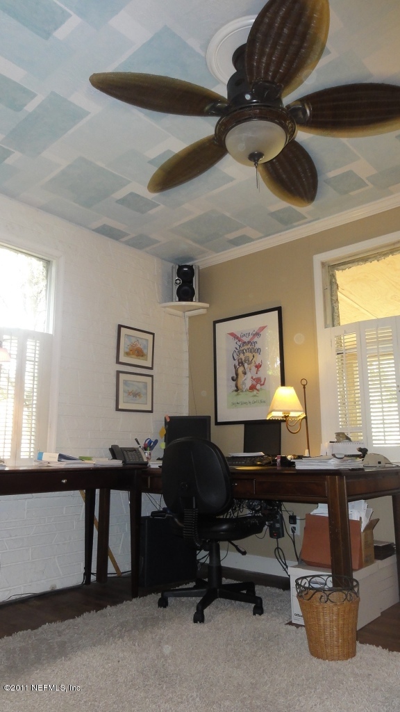44002 Prancer Callahan, FL 32011 - Photo 16 of 55 a view of a workspace with furniture and a window