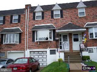 12424 Balston Road Philadelphia, PA 19154 - Photo 1 of 1 a front view of a house with parking space