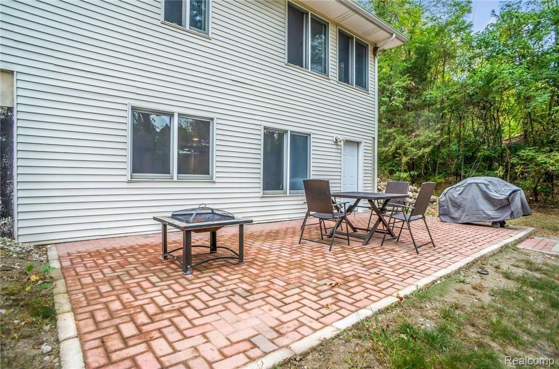7695 Teahen Road Brighton, MI 48116 - Photo 25 of 27 Brick paver patio.