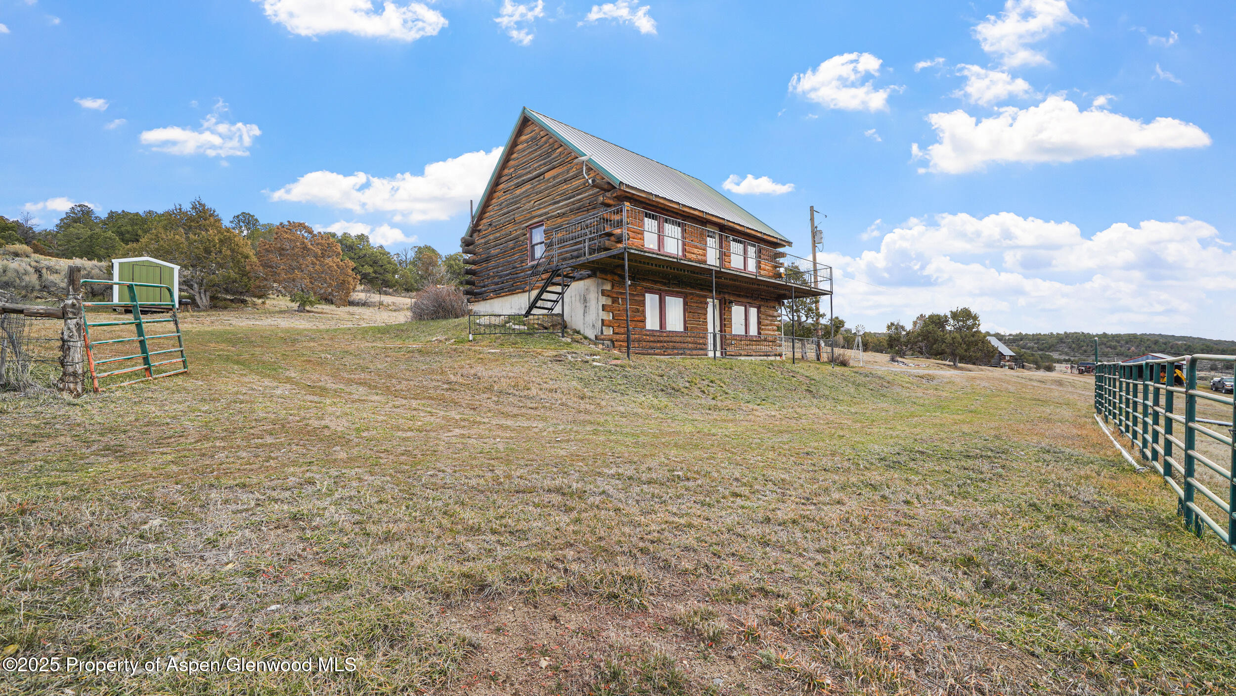 41 County Road 9 Meeker, CO 81641 - Photo 30 of 43 a view of a house with a yard