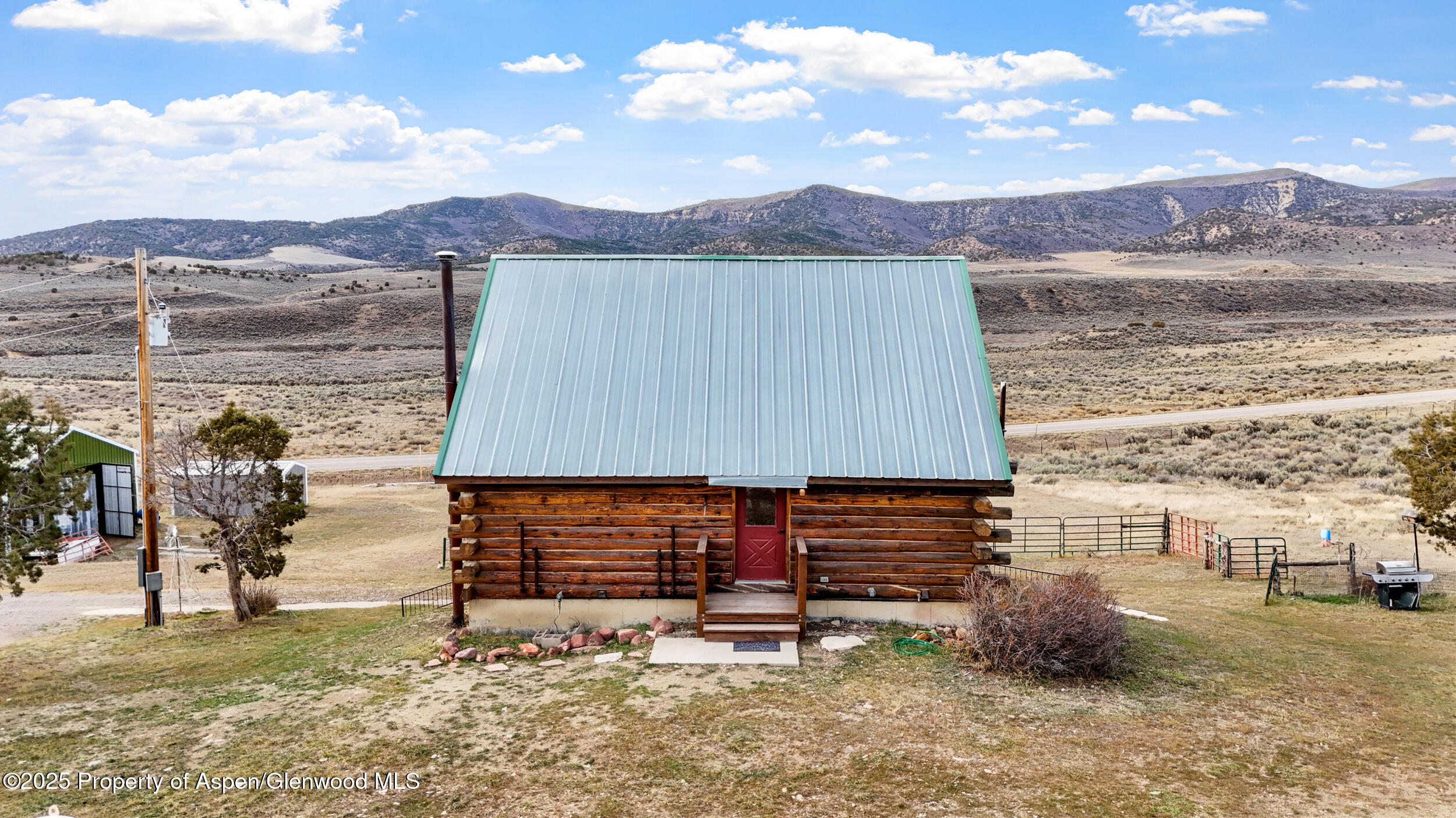 41 County Road 9 Meeker, CO 81641 - Photo 3 of 43 a view of a house with a yard