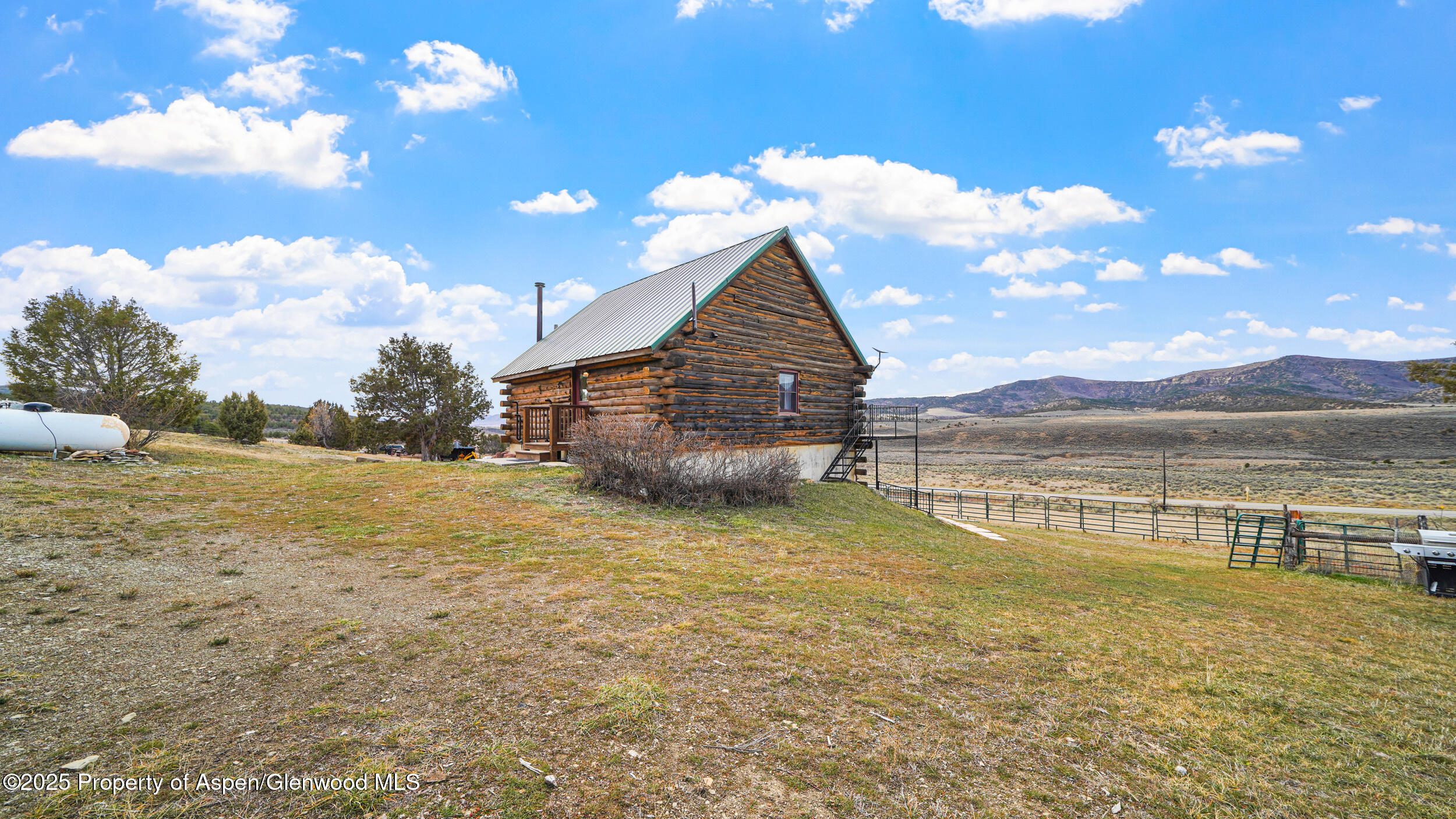 41 County Road 9 Meeker, CO 81641 - Photo 31 of 42 a view of a house with a yard