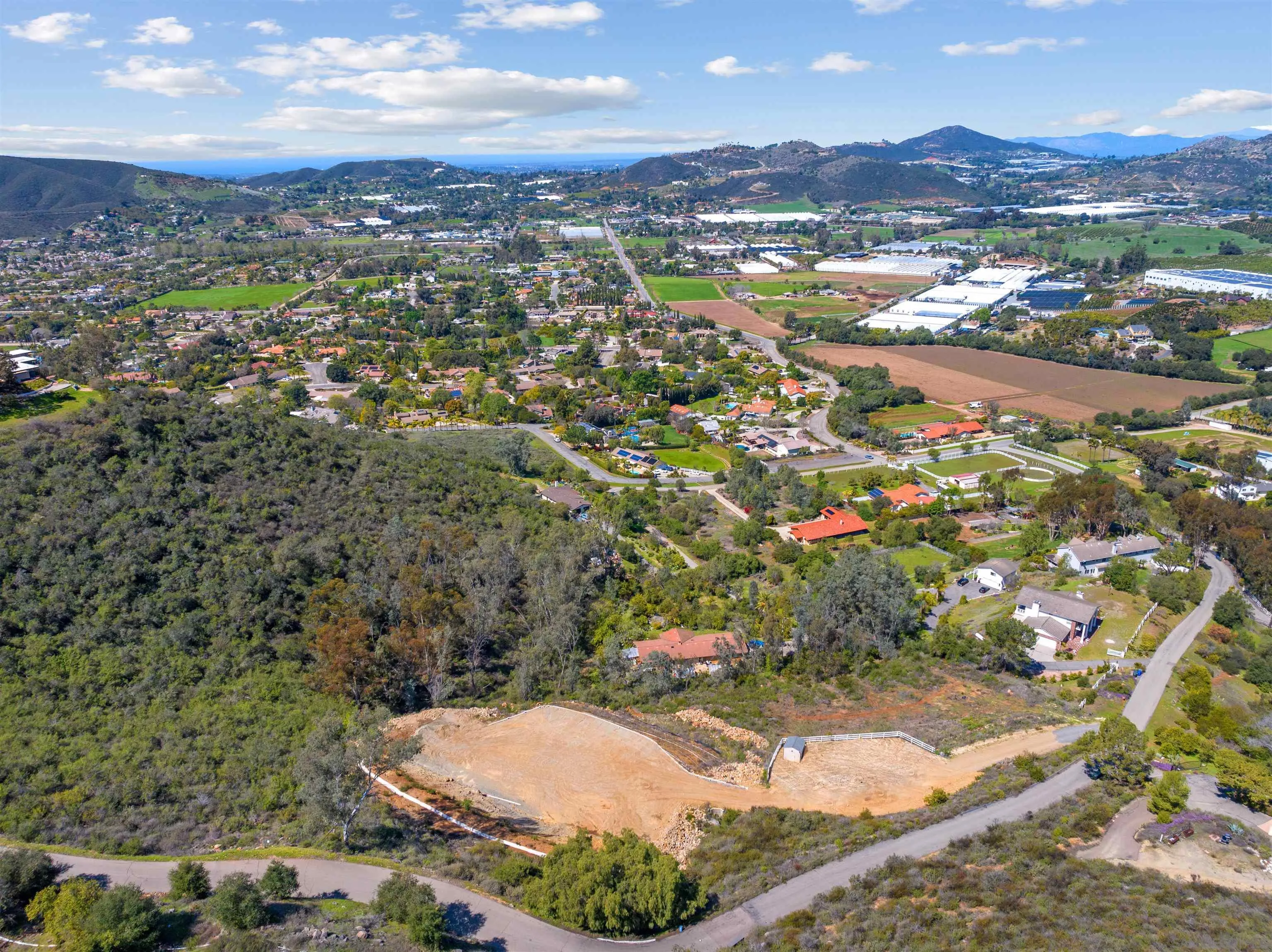 827 Eucalyptus Woods Road, Unit R006 San Marcos, CA 92069 - Photo 25 of 34 a view of a city with mountains