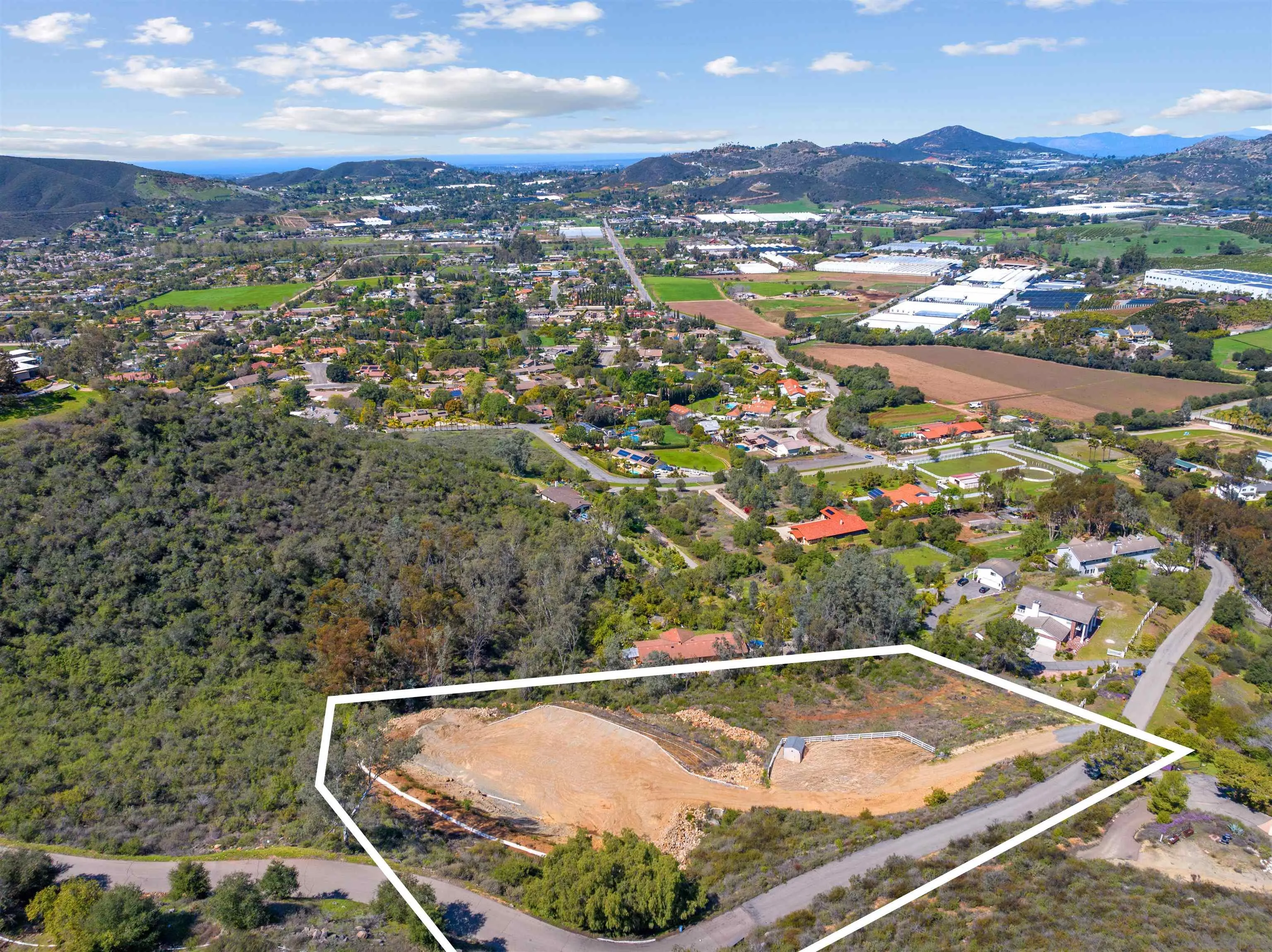 827 Eucalyptus Woods Road, Unit R006 San Marcos, CA 92069 - Photo 26 of 34 an aerial view of a residential houses with city view