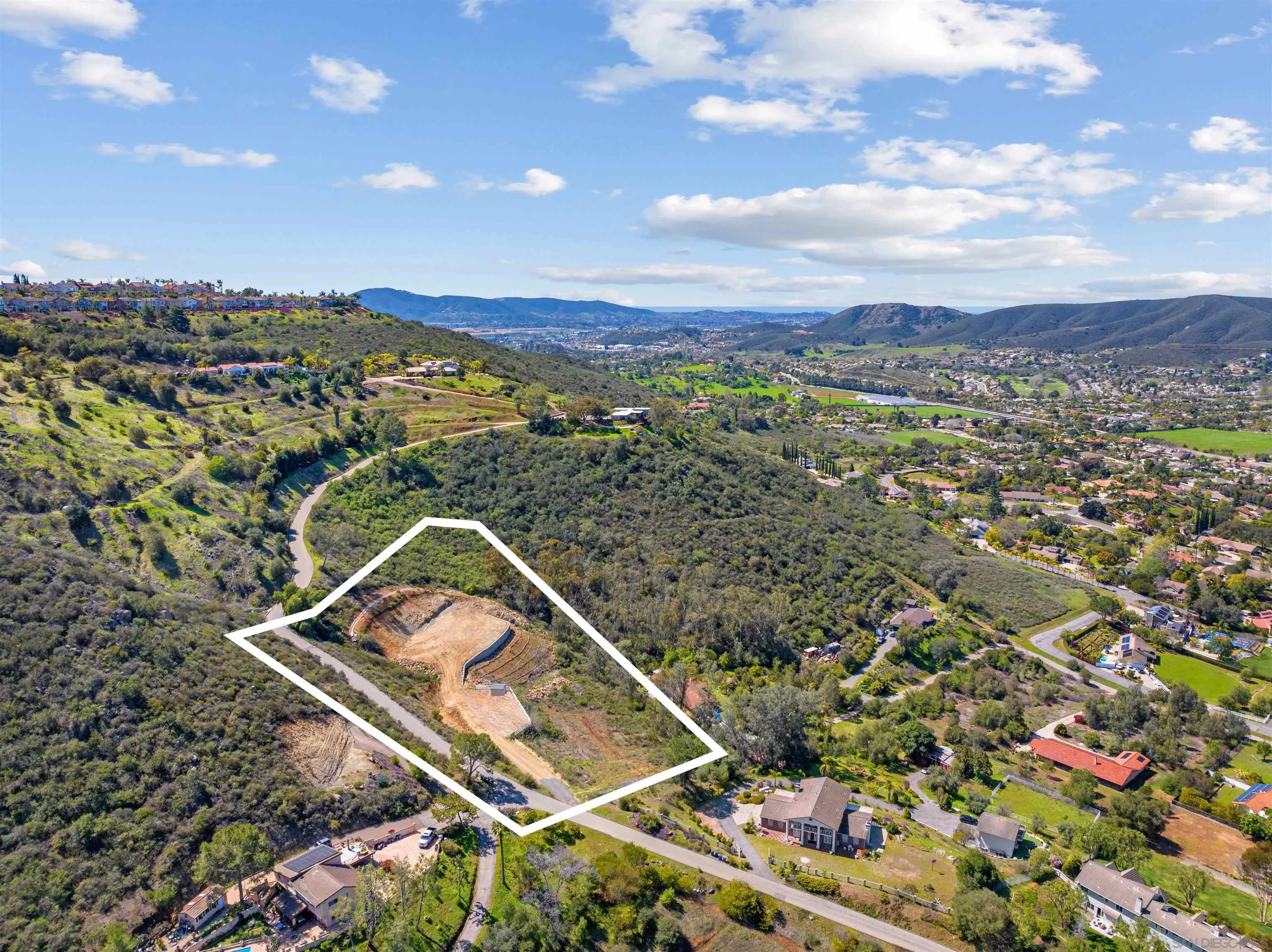 827 Eucalyptus Woods Road, Unit R006 San Marcos, CA 92069 - Photo 5 of 34 an aerial view of a residential houses with city view