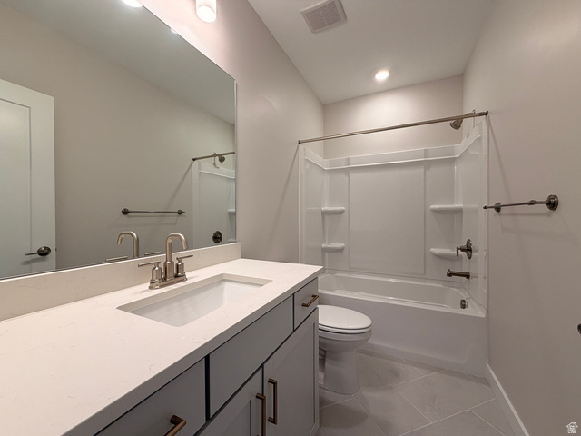539 East Rimrock Lane Heber City, UT 84032 - Photo 11 of 13 Bathroom featuring a white integrated sink, light-toned countertop, and a vanity with bronze-toned hardware