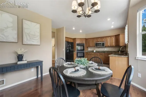 a view of a dining room with furniture