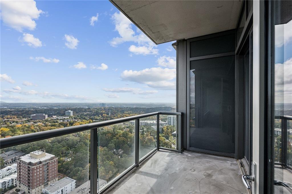 3630 Peachtree Road Northeast, Unit 3106 Atlanta, GA 30326 - Photo 14 of 41 a view of a balcony with an outdoor space