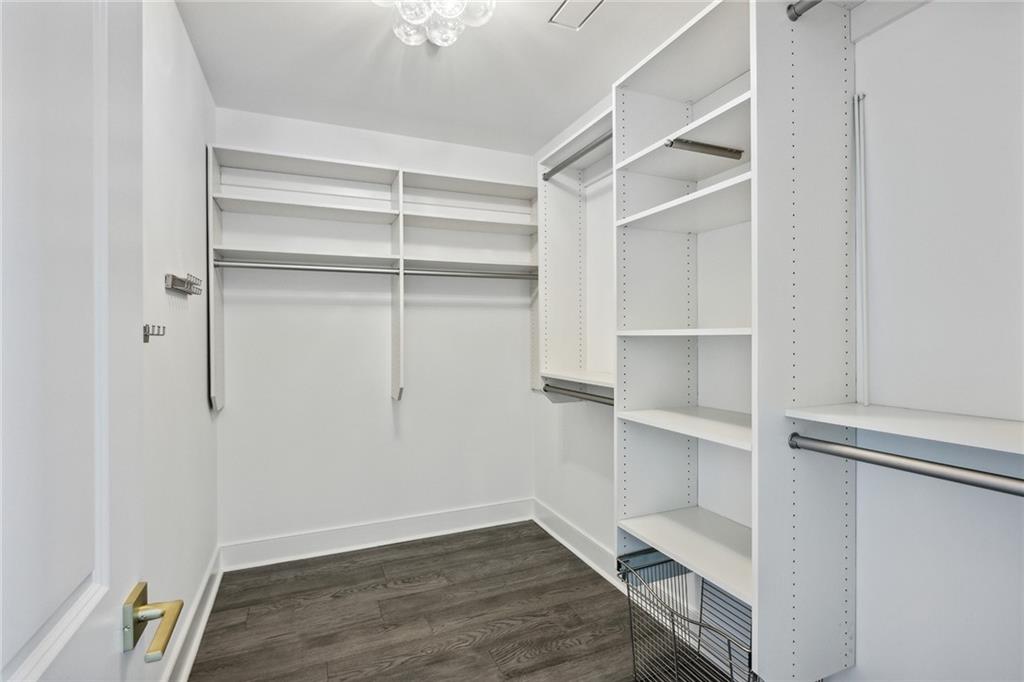 3630 Peachtree Road Northeast, Unit 3106 Atlanta, GA 30326 - Photo 16 of 41 a view of walk in closet with empty racks