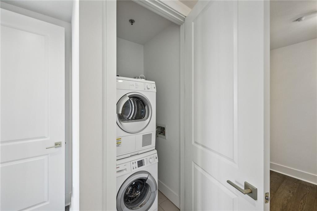 3630 Peachtree Road Northeast, Unit 3106 Atlanta, GA 30326 - Photo 20 of 41 a utility room with dryer and washer