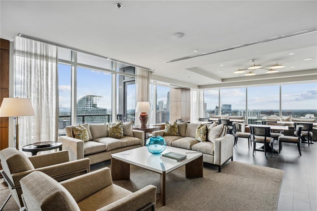 3630 Peachtree Road Northeast, Unit 3106 Atlanta, GA 30326 - Photo 24 of 41 a living room with furniture and a large window