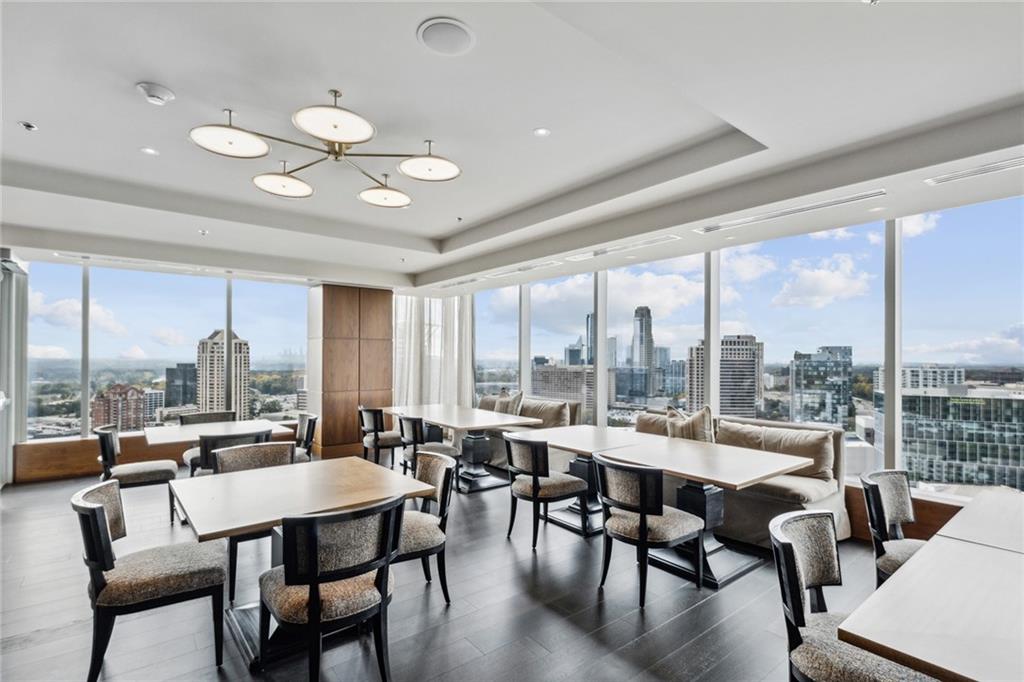 3630 Peachtree Road Northeast, Unit 3106 Atlanta, GA 30326 - Photo 25 of 41 a view of a dining room with furniture window and outside view