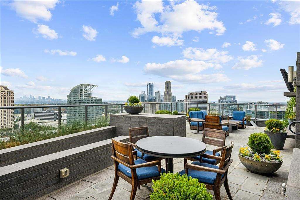 3630 Peachtree Road Northeast, Unit 3106 Atlanta, GA 30326 - Photo 33 of 41 a view of a balcony and mountain view