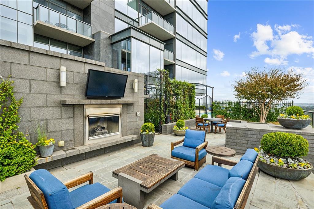 3630 Peachtree Road Northeast, Unit 3106 Atlanta, GA 30326 - Photo 34 of 41 a building outdoor space with patio furniture