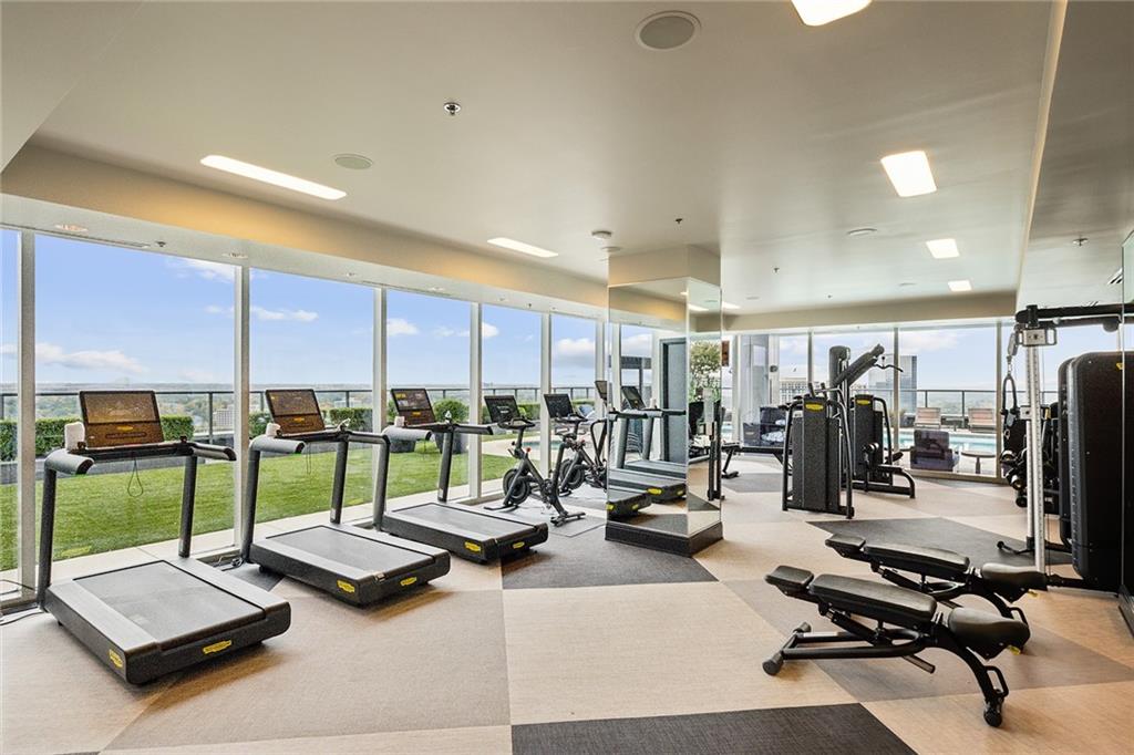 3630 Peachtree Road Northeast, Unit 3106 Atlanta, GA 30326 - Photo 36 of 41 a view of a room with gym equipment