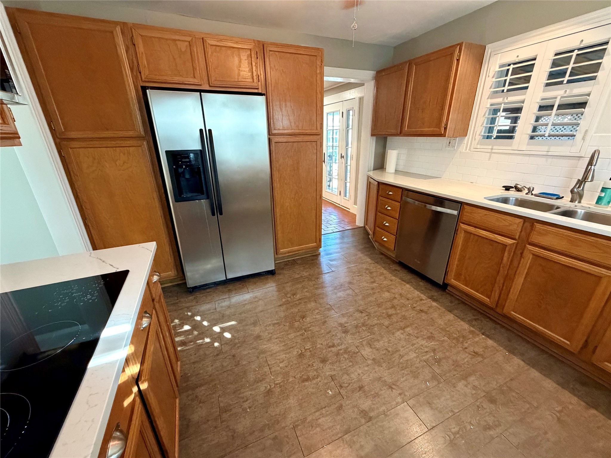 1621 Cherryhurst Street Houston, TX 77006 - Photo 13 of 21 a kitchen with stainless steel appliances granite countertop a refrigerator and a sink