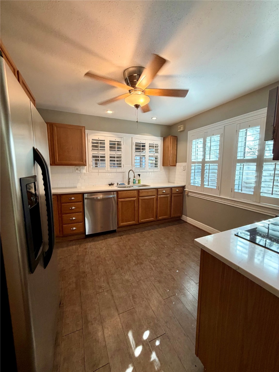 1621 Cherryhurst Street Houston, TX 77006 - Photo 14 of 21 a large kitchen with stainless steel appliances granite countertop a refrigerator and a stove top oven