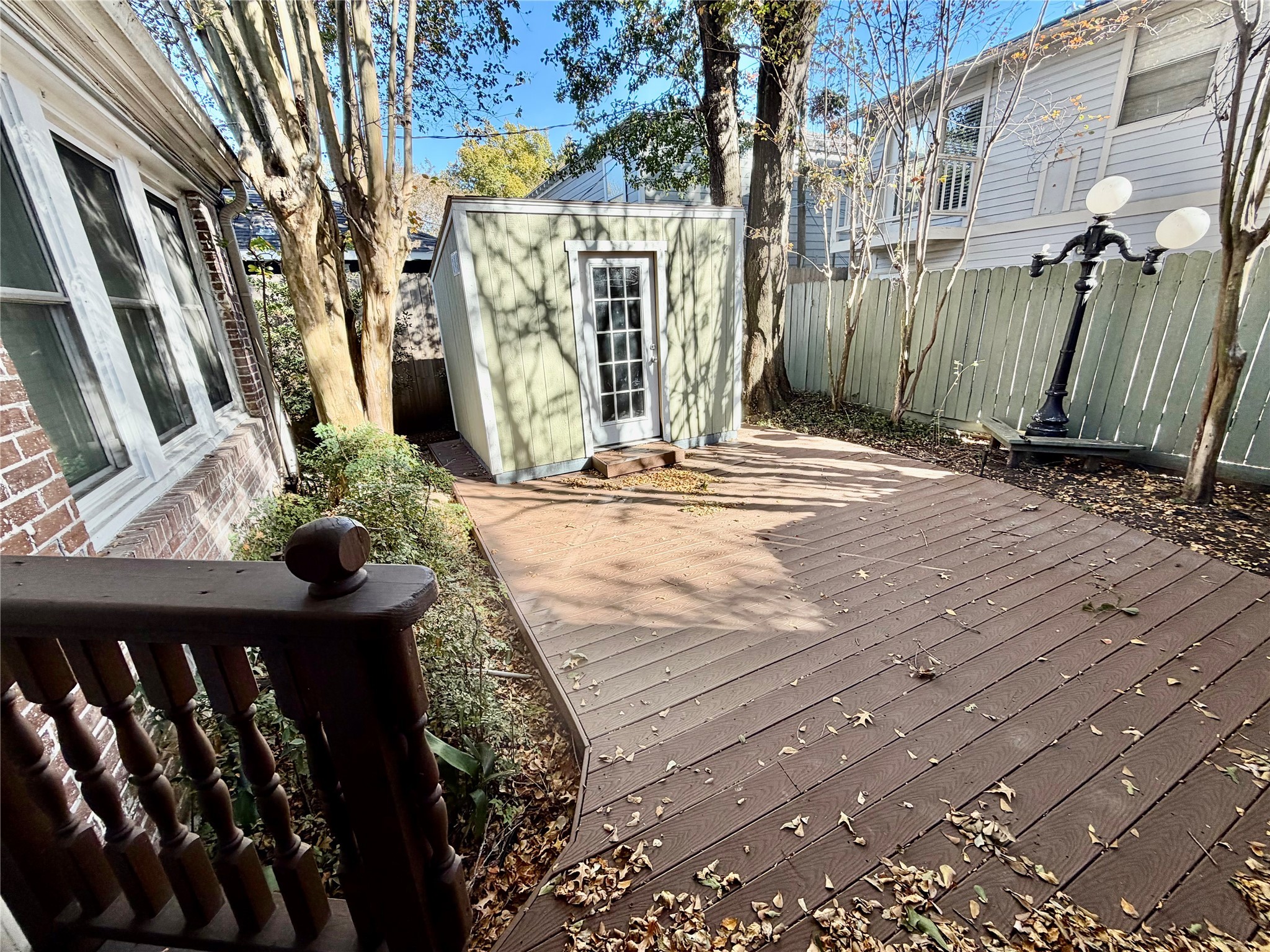 1621 Cherryhurst Street Houston, TX 77006 - Photo 21 of 21 a view of a house with wooden fence