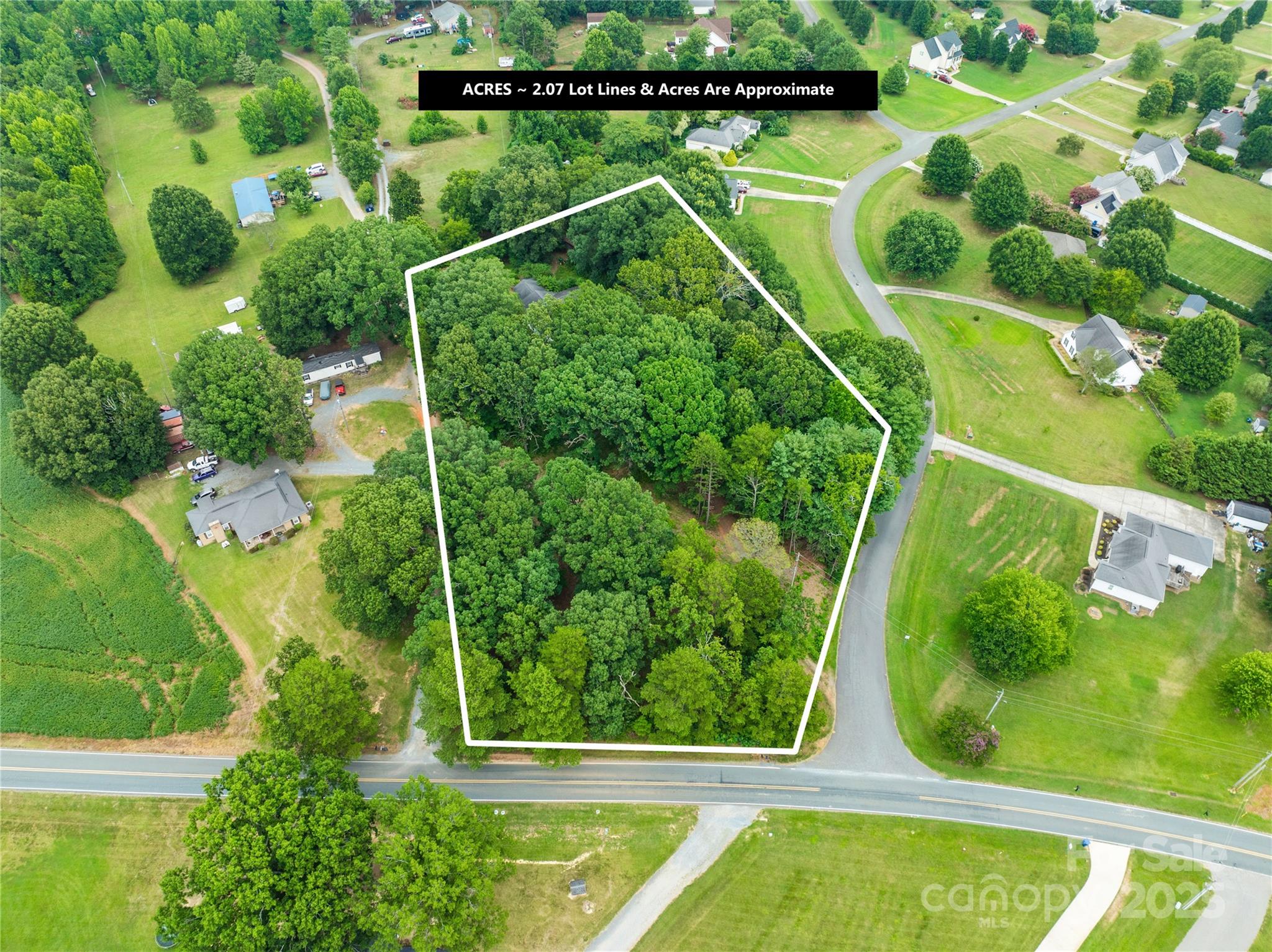 an aerial view of a golf course with swimming pool