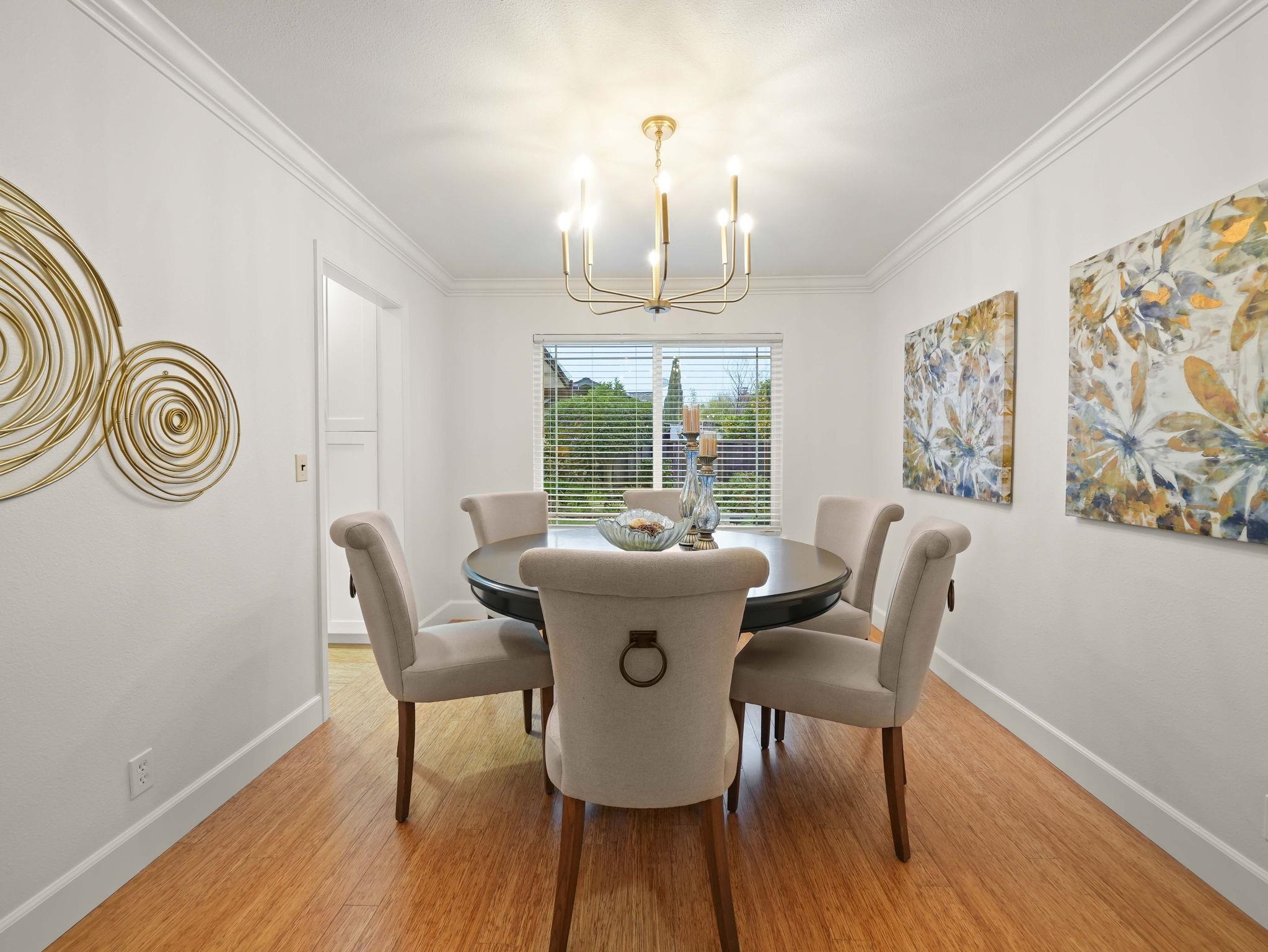 3433 Surry Place Fremont, CA 94536 - Photo 11 of 53 a view of a dining room with furniture window and wooden floor