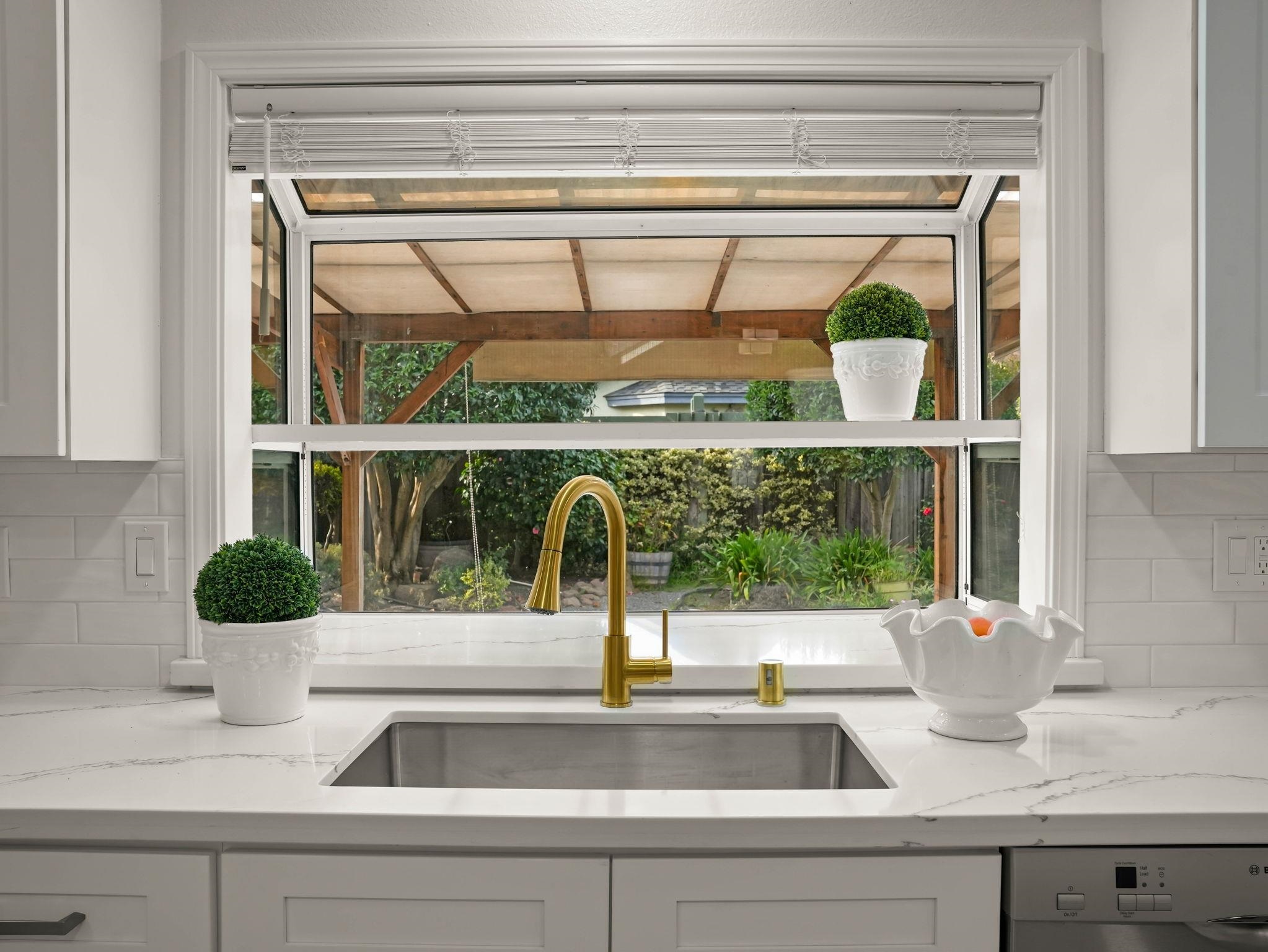 3433 Surry Place Fremont, CA 94536 - Photo 17 of 53 a kitchen with a sink and a window