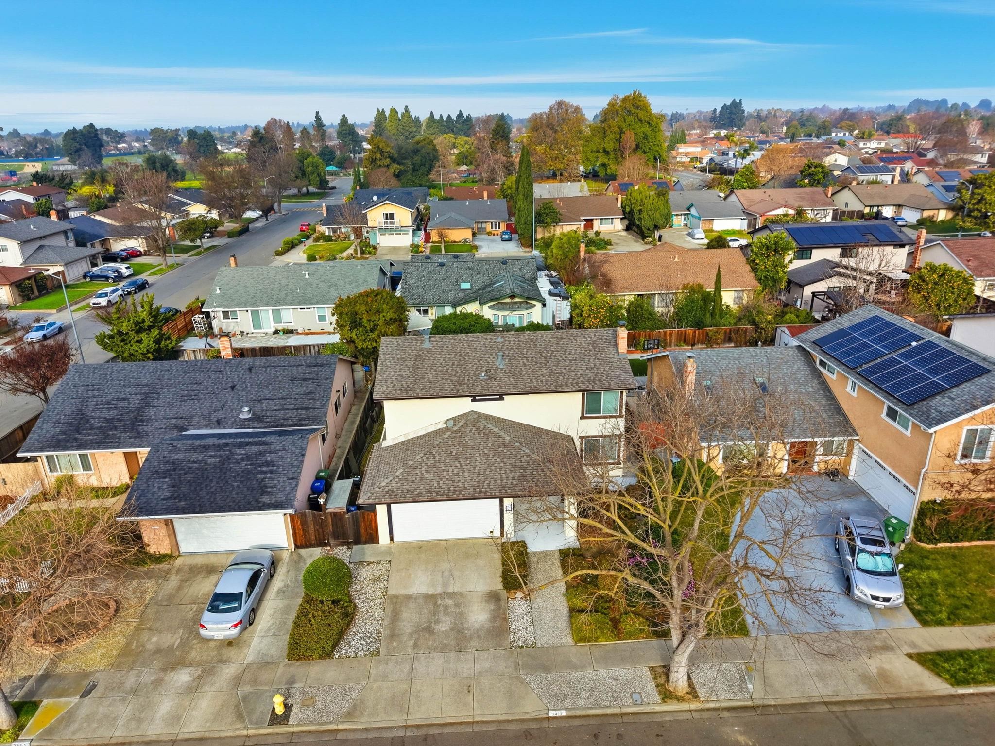 3433 Surry Place Fremont, CA 94536 - Photo 2 of 53 an aerial view of residential houses with outdoor space