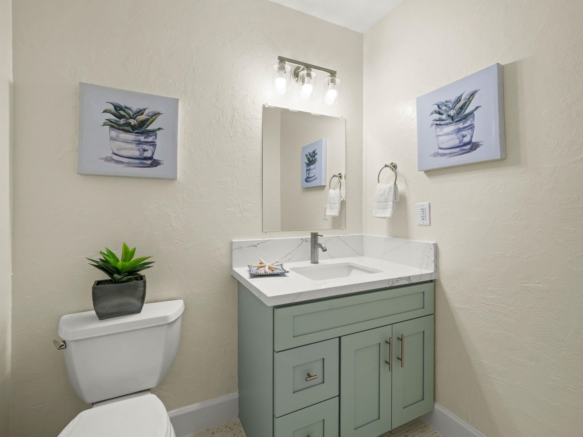3433 Surry Place Fremont, CA 94536 - Photo 22 of 53 a bathroom with a toilet sink and mirror